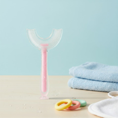 Szczoteczka silikonowa do zębów w kształcie U Różowa / Bocioland